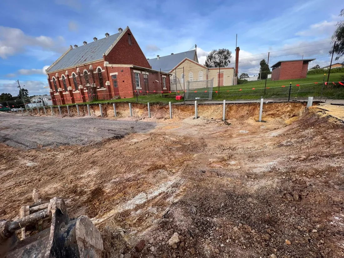 Retaining work alongside a heritage building